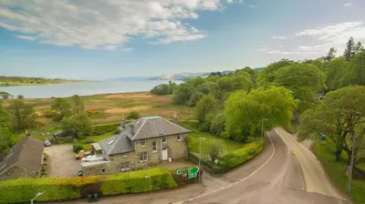 an aerial view of a house and a road at The Corran in Lochgilphead