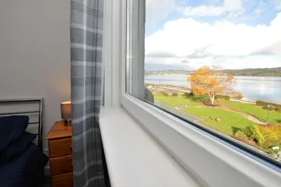 a window with a view of the water at Anchor View in Ardrishaig