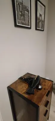 a wooden desk with a phone on top of it at Anchors Rest in Ayr