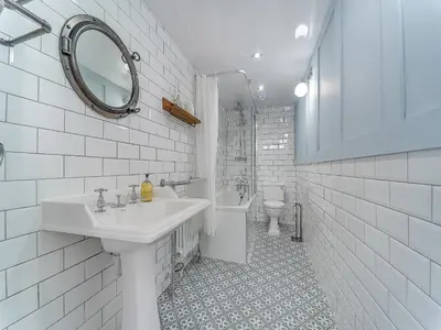 a white bathroom with a sink and a toilet at 3 Ladyknowe Uk39969 in Moffat