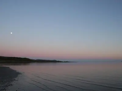 a large body of water with the horizon at The Coach House at Stewart Hall in Rothesay