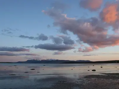 a view of a beach with a cloudy sky at The Coach House at Stewart Hall in Rothesay