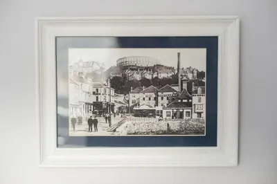 a black and white picture of a city at The Distillers Den in Oban