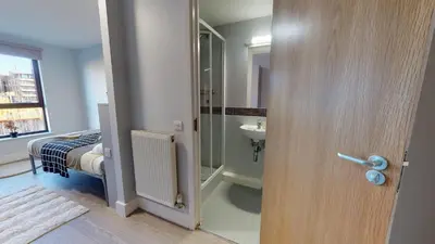 a room with a bathroom with a sink and a toilet at Studios and Ensuite Bedrooms with Shared Kitchen at Fountainbridge in Edinburgh in Edinburgh