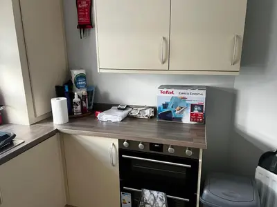 a kitchen with a counter top and a stove at 5 minutes to Glasgow airport in Paisley