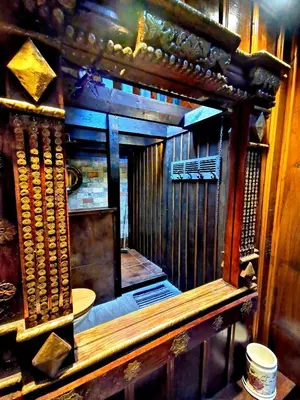 a large wooden room with a toilet in it at Ranch House in Newton Stewart