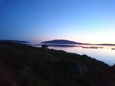 a view of a body of water at sunset at Catkin Lodge - Uk39646 in Lunga