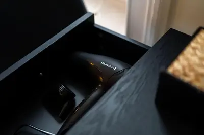 a hair brush sitting on top of a counter at The Devonshire Suite - Your 5 STAR West End Stay! in Glasgow