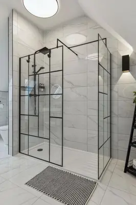 a shower with glass doors in a bathroom at Little Gleddoch in Dumbarton