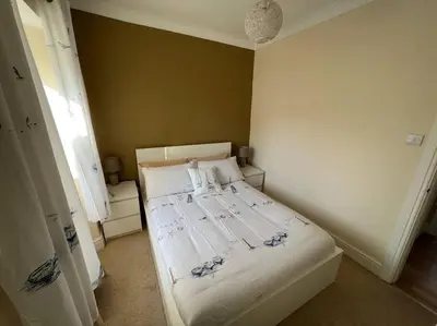 a small bedroom with a bed in a room at Fantastic 3 bedroom holiday home in Millport