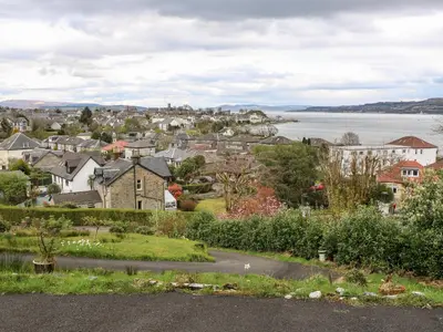 a city with houses and the water in the background at Mars Hill Lower in Dunoon