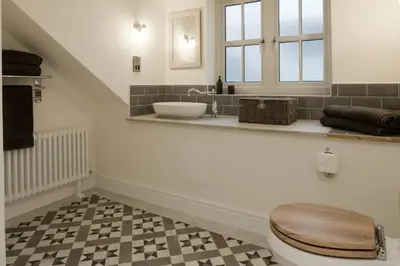 a bathroom with a toilet and a sink at Stroan in New Galloway